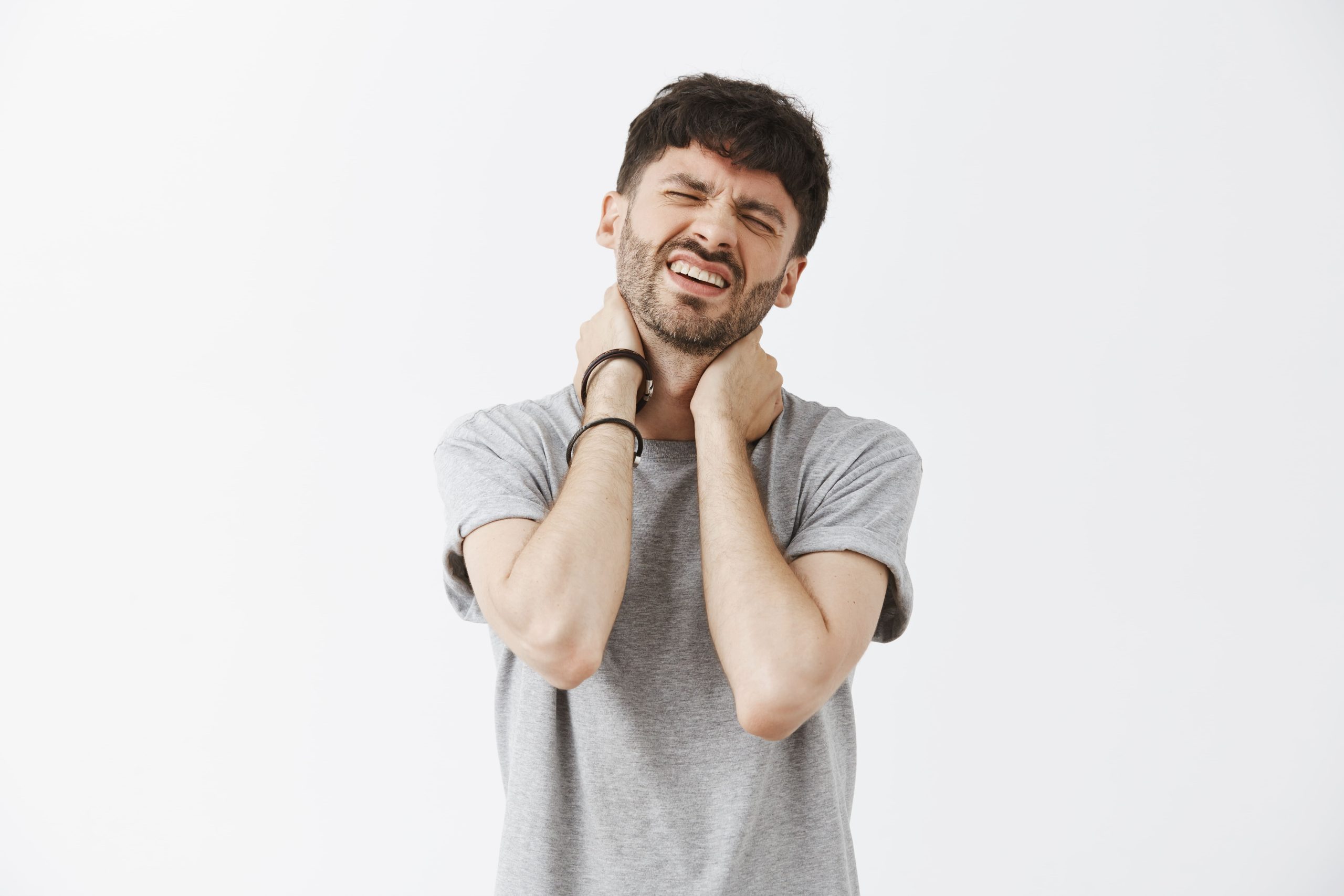 tired-sick-handsome-guy-posing-against-white-wall (1)