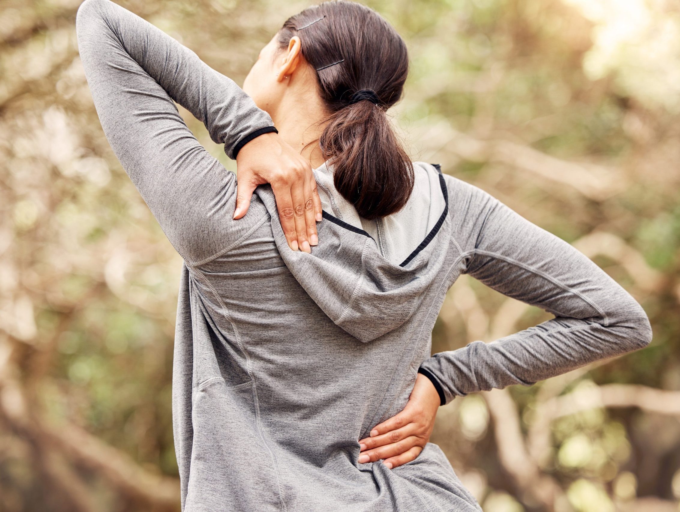 rearview-shot-of-a-woman-experiencing-back-pain-wh-2025-04-06-07-31-05-utc (1)
